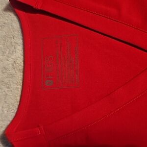 FIGS pop red Tech collection top. Size M. 3 pockets